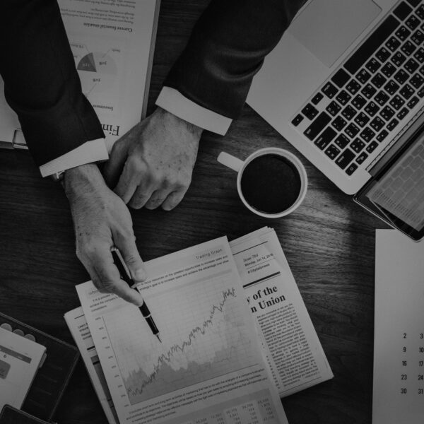 financial office environment with professionals working on documents and digital systems in banking and insurance industry