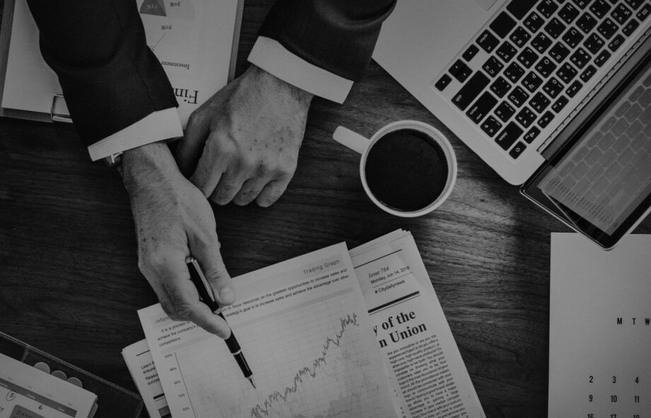 financial office environment with professionals working on documents and digital systems in banking and insurance industry