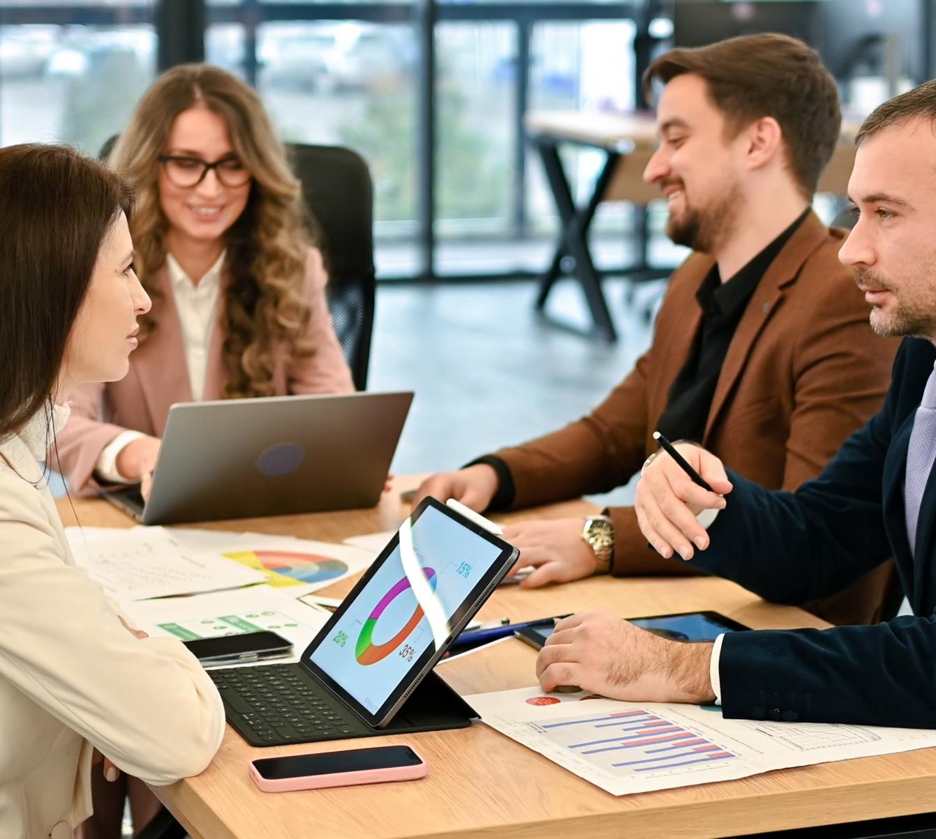 Business meeting discussing website conversion optimization — DETAY Tech insights